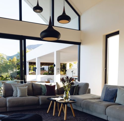 View of living room interior of a modern house. Modern architecture and interior designing concept View of living room interior of a modern house. Modern architecture and interior designing concept